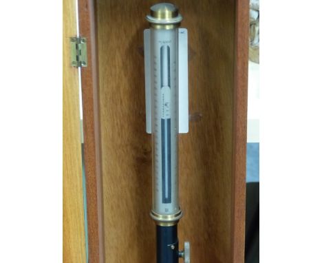 A MAHOGANY CASED NEGRETTI AND ZAMBRA M/6990 MARINE STICK BAROMETER, THE SILVERED SCALE AT THE TOP OF THE MERCURY COLUMN ABOVE