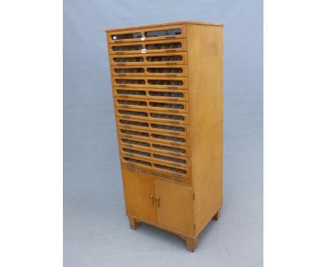 A GOOD VINTAGE GLAZED THIRTEEN DRAWER SHOP DISPLAY / DISPENSING CABINET WITH A FOURTEENTH DRAWER MARKED COLOUR RANGE PANEL AB