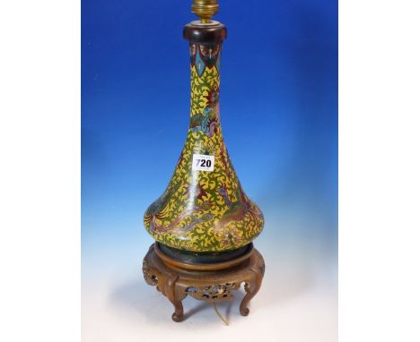 A CHINESE CLOISONNE VASE FORM TABLE LAMP, THE FOOT OF THE TRUMPET SHAPE MOUNTED ONTO A WOOD STAND, THE YELLOW GROUND BODY WOR