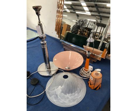 A CHROME TABLE LAMP WITH PINK GLASS UPLIGHTER SHADE.   H 72cms. TOGETHER WITH AN ORANGE PLASTIC LIGHT WITH ART DECO ORANGE AN