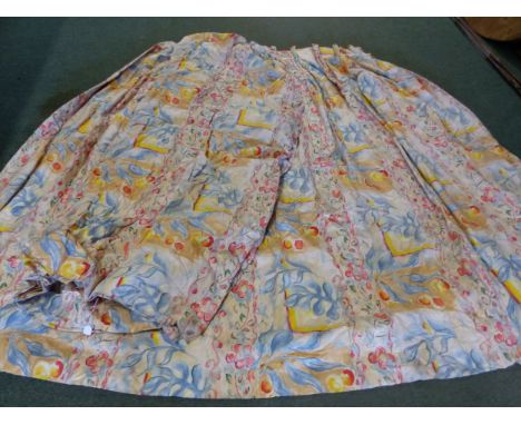 A PAIR OF CURTAINS IN THE TASTE OF DUNCAN GRANT DECORATED WITH BLUE FRONDS, RED FLOWERS AND YELLOW BRACKETS, EACH DROP.   203