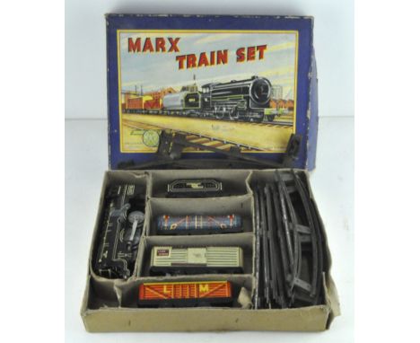 A Louis Marx &amp; co ltd clockwork train set, in original box, including locomotive, tender and track, all in original box