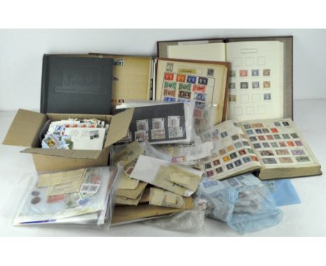 A collection of stamps and First Day covers