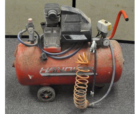 A handy air compressor with petrol combustion engine