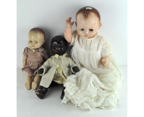A group of three vintage dolls including one by Pedigree