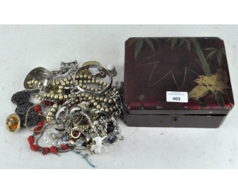 A selection of vintage costume jewellery, all in an oriental lacquered box