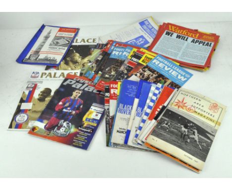 A quantity of vintage football programmes and reviews, including examples from the 1960's, Charlton Athletic, QPR and more