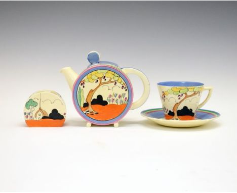 Clarice Cliff Bonjour shape teapot decorated with the Tulips pattern, 13.5cm high, together with a matching sugar basin and c