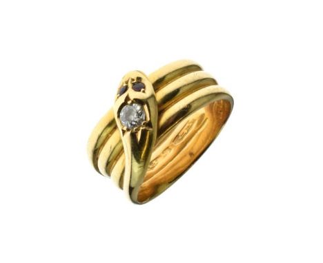 Edwardian diamond and garnet 18ct gold serpent ring, Chester 1907, the coiled reptile with an old cut brilliant of approximat
