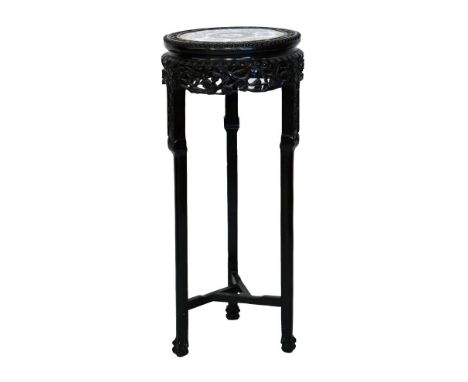 19th Century Chinese carved plantstand, the circular top inset with a Famille Rose panel having six reserves each decorated w