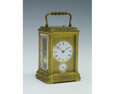 19th Century engraved brass gorge cased repeat carriage clock, the white enamel dial with Roman numerals and the subsidiary a