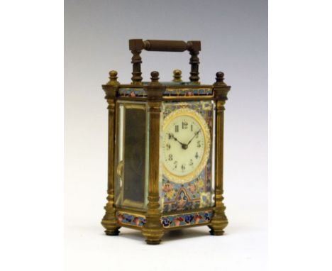 Late 19th Century French brass and enamel cased carriage clock, the case with a reeded pillar to each corner, conforming hand