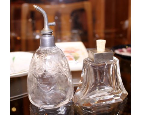 PERFUME BOTTLES. Two vintage perfume bottles one Art Deco with silver collar