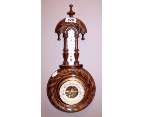 ANEROID BARMOETER. Antique aneroid barometer thermometer with carved wooden case A/F 