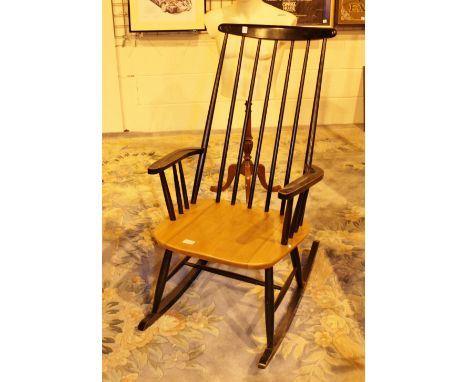 ROCKING CHAIR. Modern stick back rocking chair