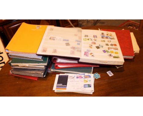 WORLDWIDE POSTAGE STAMPS. Fifteen albums of worldwide postage stamps and first day covers