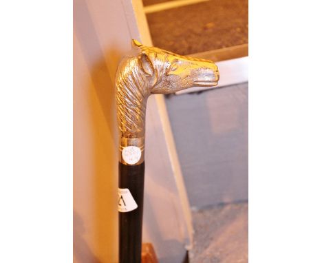 WALKING STICK. White metal horse head handled walking stick
