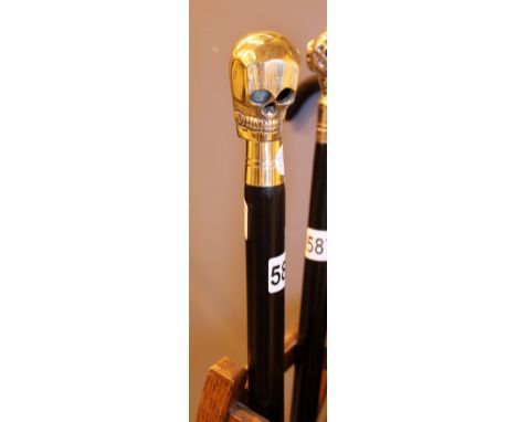 WALKING STICK. Brass skull handled walking stick