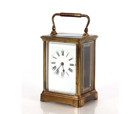A brass cased carriage timepiece,&nbsp;with white enamel Roman numeral dial, 13.5cm high&nbsp;