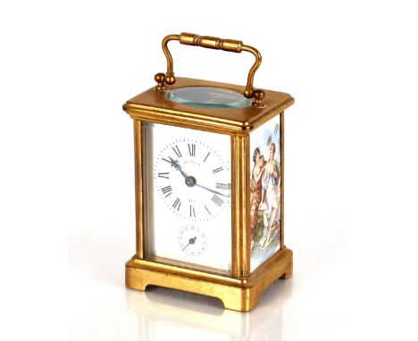 A brass cased carriage clock,&nbsp;with enamel panels inscribed "Lagrosse, Lyon", with alarm movement striking on a bell, 12c