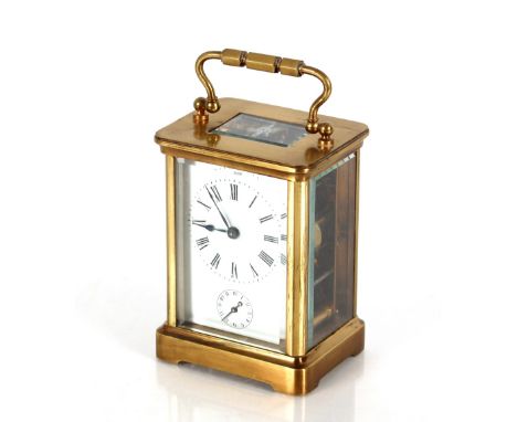 A brass cased carriage clock,&nbsp;with alarm movement, impressed to the reverse R. &amp; Co. Paris, 11cm high&nbsp;