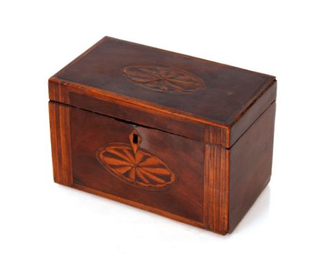 A Georgian mahogany and cross banded tea caddy, with shell inlaid decoration 