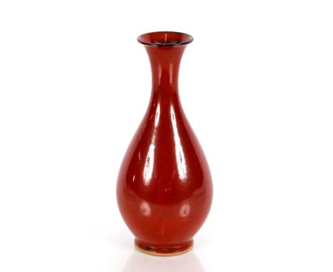A Chinese Sang de Boeuf and speckled&nbsp;glazed vase,&nbsp;on slender baluster form raised seal to base, 25cm high&nbsp;