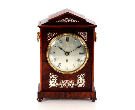 A 19th Century rosewood and mother of pearl inlaid bracket timepiece,&nbsp;having circular silvered dial by Ebenezer Fisher, 