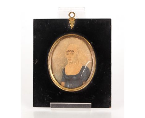 A 19th Century miniature portrait, of a lady wearing a lace cap and blue dress, (faded), contained in an ebonised and gilt fr