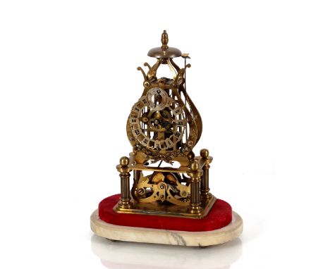 A 19th Century brass skeleton clock, having steel chapter ring, the movement striking on a top bell under glass dome, 35cm hi