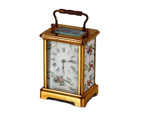 A brass cased and enamel panelled&nbsp;carriage clock,&nbsp;decoration of exotic birds, the reverse stamped E.H., 11cm high&n