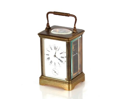 A brass carriage clock,&nbsp;with alarm movement, stamped to the back plate H. J. with bird motif, 13cm high&nbsp;