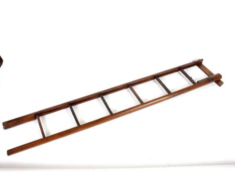 A pitch pine folding metamorphic library ladder / pole,&nbsp;230cm long&nbsp;