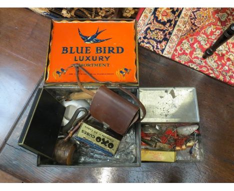A Blue Bird tin with contents including Army Club cigarettes ashtray and pipes, and a tin of fly fishing weights etc 