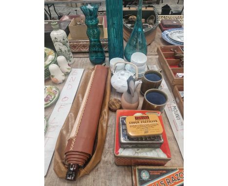 A leather scroll bearing a print of a dog, three art glass vases, tin boxes, tea wares, etc.