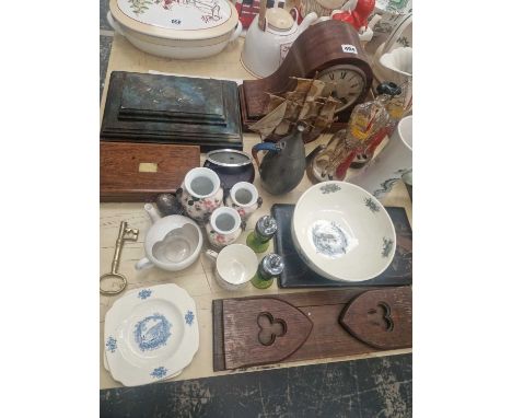 A Wedgwood Rex Whistler Clovelly bowl, a mantle clock, an oak book slide, glass matador bottles, two handled oval bowls, etc