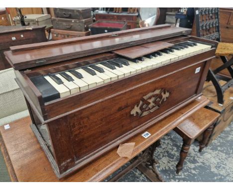 A portable harmonium ( fomerly with folding legs)