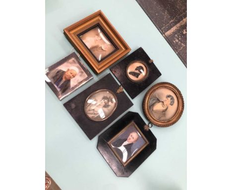 A group of miniature portrait pictures etc. 