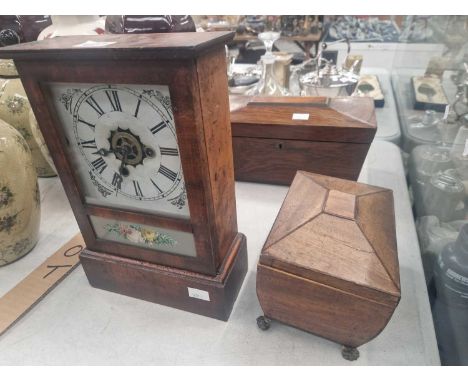 Two 19th C. sarcophagus tea caddies together with a Welch alarm clock 
