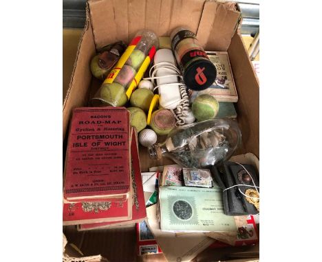 Vintage road maps, military badges, ship-in-a-bottle etc.  