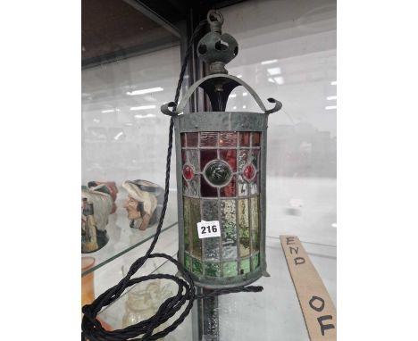 An Arts ad Crafts leaded coloured glass cylindrical lantern