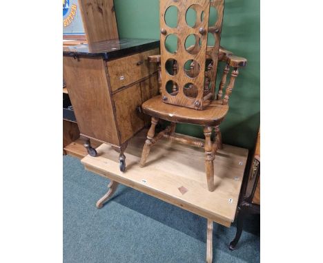 A pinelow coffee table, a wine rack, a rustic chair and  an art deco walnut drinks cabinet.