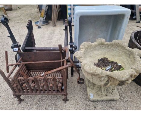 A composite terrace planter, a belfast sink and two cast iron fire baskets