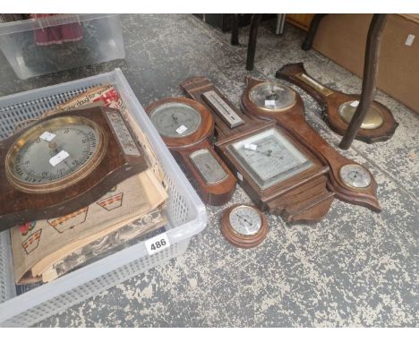 An interesting collection of various wall barometers and vintage Radio Times magazines etc