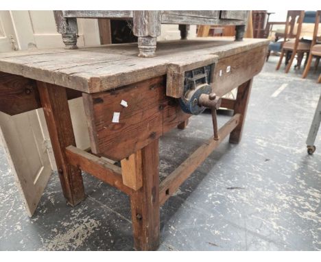 A vintage low carpenters bench. 137 x 54 x 66 cm high.