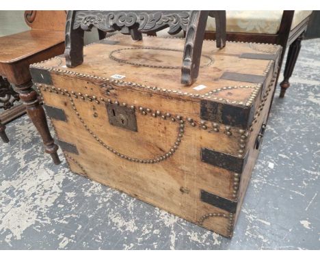 A late Georgian pine and brass studwork carriage trunk.