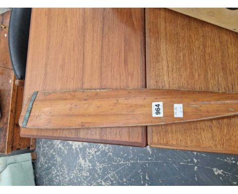 Two vintage rowing oars.