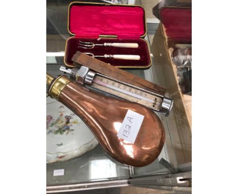 A pair of mother-of-pearl handled cased forks, a folding ruler, a powder flask, and a thermometer. 