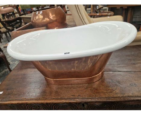 An unusual copper and white enamel basin of bath form. H 26 W 67 D 37 cm.