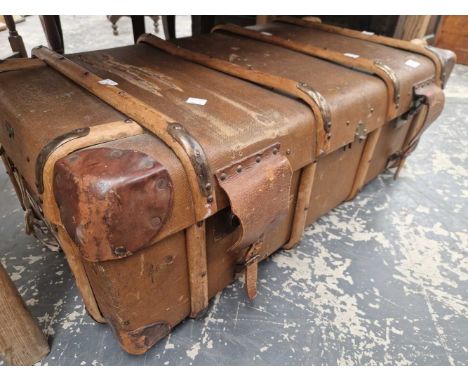 A vintage wood slat cabin trunk